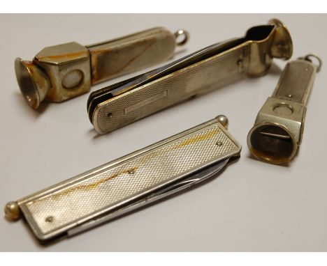 Three various engine turned silver on steel cigar cutters; and one other engine turned silver on steel pocket knife (4)