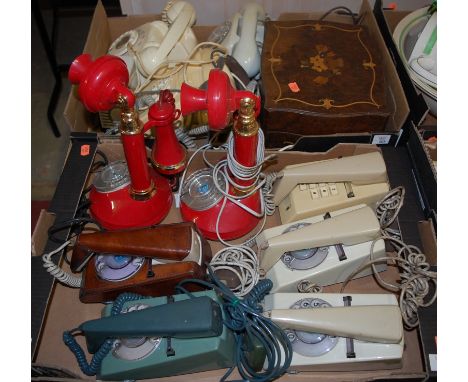 Two boxes of assorted vintage telephones