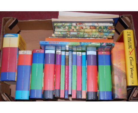 A box of miscellaneous children's books being mainly Rupert and Harry Potter examples