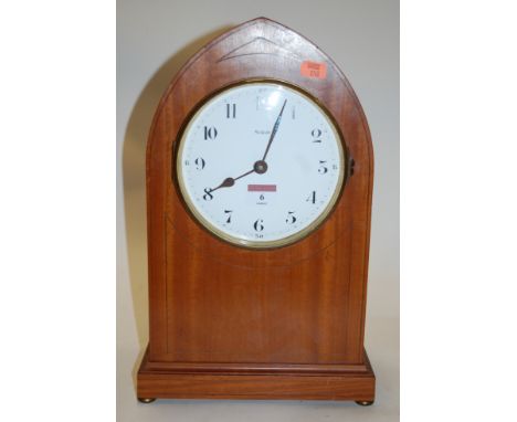 An early 20th century satinwood cased lancet shaped mantel clock, of large proportions, having an enamelled dial with Arabic 