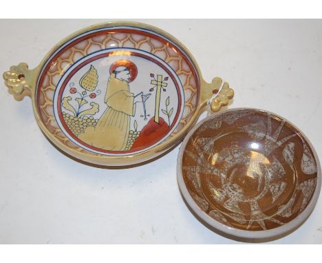 A 20th century lustre twin handled shallow bowl, the central panel depicting a monk in prayer, signed Gubbio PR verso, w.27cm