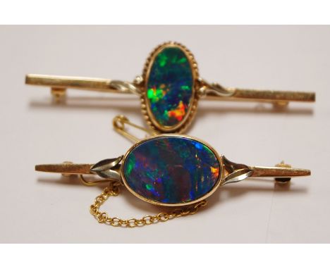 A 9ct gold and opal set bar brooch and one other similar with safety chain, gross weight 11.8g (2)   Condition Report / Extra