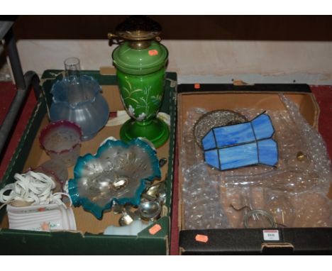 Two boxes of miscellaneous items to include Victorian glass oil lamp, various frilled glass oil lamp shades, and chimneys etc