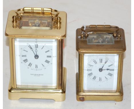 A mid 20th century English lacquered brass cased carriage clock having a white enamel dial with Roman and Arabic numerals, vi