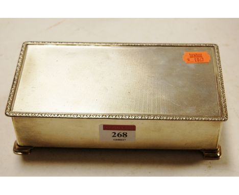 A 1950s silver table cigarette box having all over engine turned decoration by Mappin & Webb   Condition Report / Extra Infor