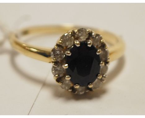 A ladies 18ct gold, sapphire and diamond cluster ring, size R   Condition Report / Extra Information  Weight 3.9g.