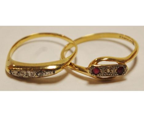 A ladies yellow gold small pavé set diamond dress ring; together with an 18ct gold, ruby and diamond set three stone ring (2)