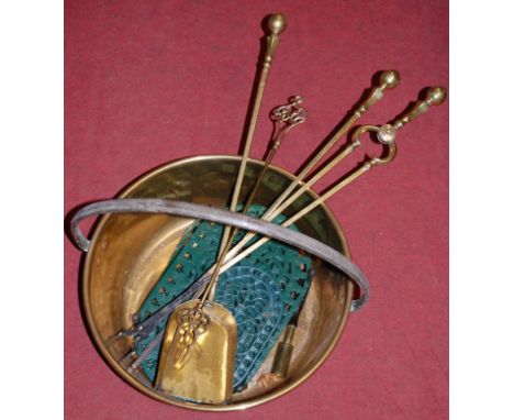 A Victorian brass preserve pan; together with a set of three turned brass fire tools; and a toasting fork etc 