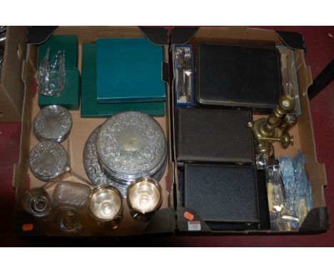 Two boxes of miscellaneous metal wares to include silver plated coasters, silver plated goblets, turned brass candlestick etc