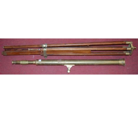 A reproduction brass telescope on tripod