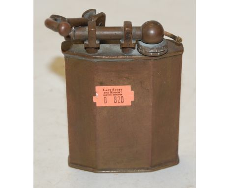 An early 20th century French Rustic brass table lighter    Condition Report / Extra Information  Top arm loose and with solde