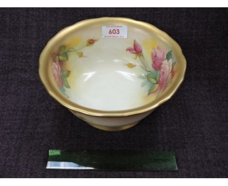 A Royal Worcester bowl having gilt heightened floral decoration by M Hunt