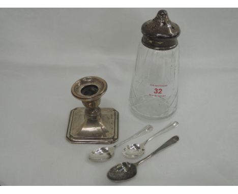 A small selection of HM silver including small candle stick glass sugar caster with silver lid and three teaspoons