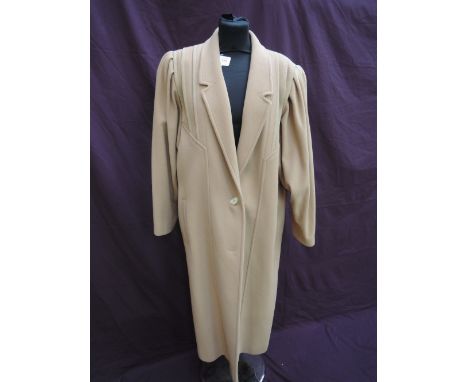 A lady's 1980's camel wool and cashmere coat by Mansfield for Harrods having leather trim to bodice and collar,  size 16