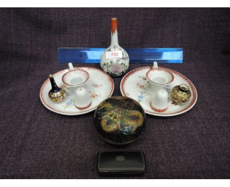 A Royal Crown Derby miniature vase in the Imari palette, similar bottle vase, a 19th century snuff box, an Oriental bottle va