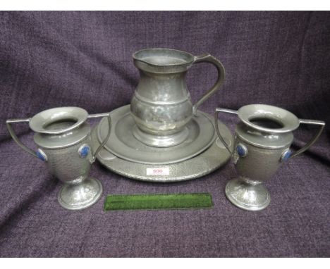 A selection of pewter including Unity pewter plaque, an 18th century plate having London touchmarks, a Victorian one quart ta