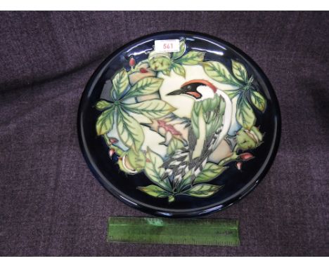 A Moorcroft plate in the Ingleswood pattern, designed by Philip Gibson, in box