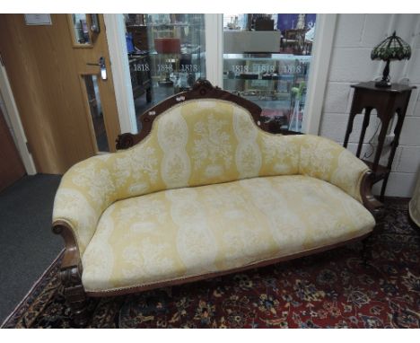 A 19th century mahogany frame settee/sofa having crest and inlay decoration with later 20th century period style upholstery, 