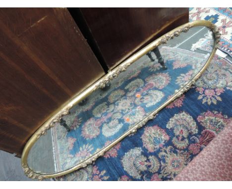 A 20th century gilt effect frame oval wall mirror