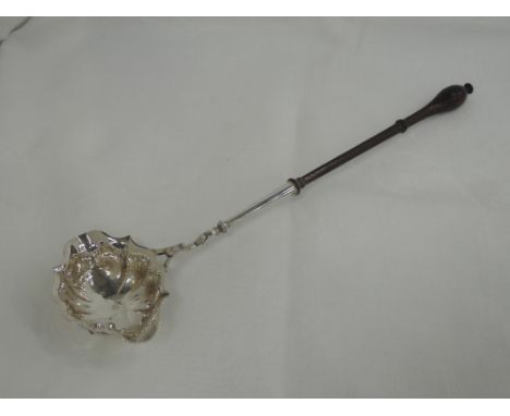 A Georgian silver punch ladle having shaped bowl and turned fruit wood handle, marks worn