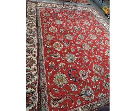 A 20th century carpet square having floral pattern on red and cream ground, 160'x120'