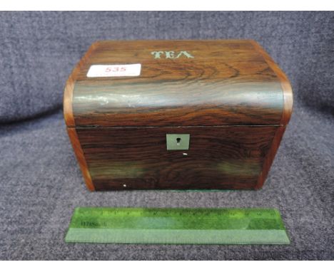 A Victorian rosewood tea caddy, having script 'tea' inlay decoration