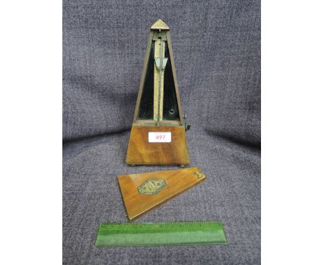 A vintage mahogany case metronome by Maelzel