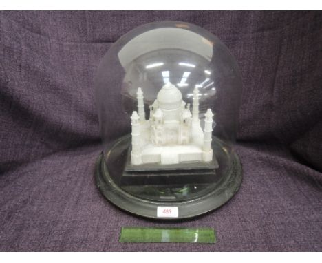 An early 20th century alabaster model of the Taj Mahal, under glass dome