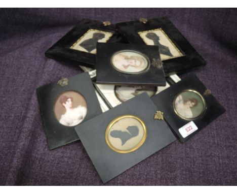 A selection of early 20th century portrait miniatures, various including painted oval and silhouette 