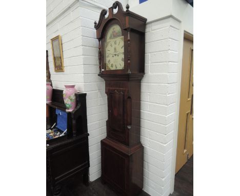 An early 19th century mahogany longcase clock having bobbin pillar and swan neck hood containing painted arch dial and 30 hou