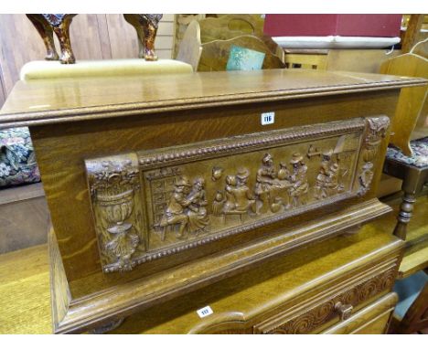 Light oak blanket box with carved front panel