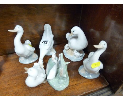 Six Nao geese figurines in various poses