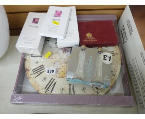 Boxed kitchen wall clock, quantity of boxed cosmetics, Waddingtons playing cards, Indian hard wood letter rack etc