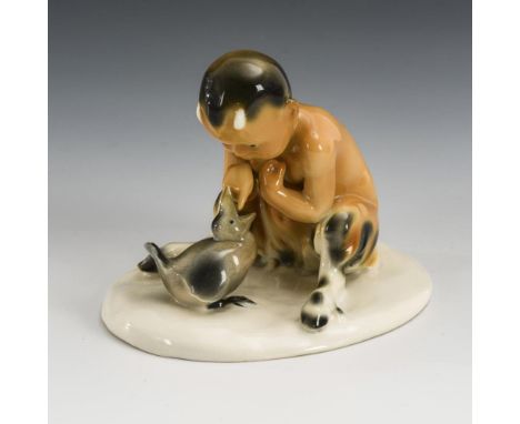 Faunsknabe mit Vögelchen    Goebel.        Blaue Pressmarke, 1923 - nach 1935.        Am Sockel bezeichnet "Gustafs".        