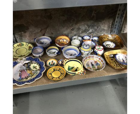 A Shelf of Hand painted Quimper porcelain wares. 