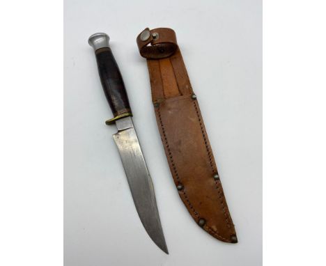 A Vintage J.H.Thompson hunting knife with leather sheath. 