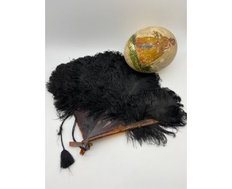 A Vintage Ostrich feather and turtle shell designed fan [as found] together with a ostrich egg. 