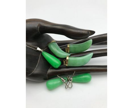 A Lot of three Gilt metal and jade horn shaped pendants together with a 10ct gold plated and jade pendant and earring set 