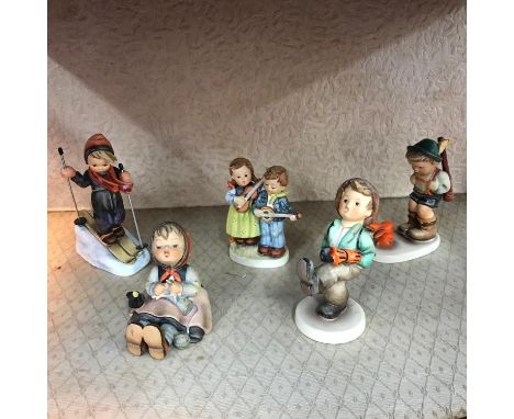 A Lot of 5 various Goebel Hummel figures to include Skier, Globe Trotter, Sensitive Hunter, Birthday Serenade and Happy Pasti