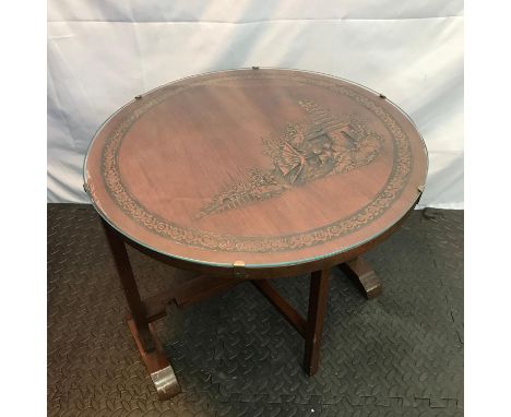 A vintage hand carved oriental flip top table set with a glass top. Carving shows figures, junk boat and pagoda tower. Measur