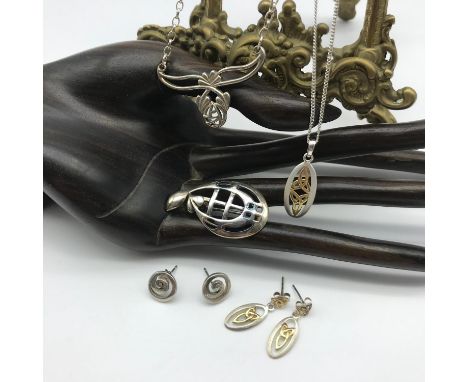 A Lot of silver 925 jewellery to include Celtic and Rennie MackIntosh design pendants, earrings and silver chains 