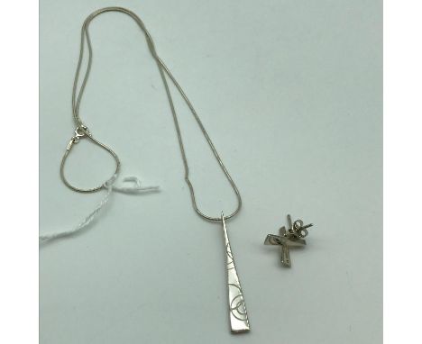 A Silver 925 and enamel pendant with chain and matching earrings. 