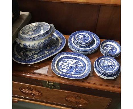 A Lot of Old Willow Pattern dinner wares to include vintage and Antique. Includes large Staffordshire serving platter and tur