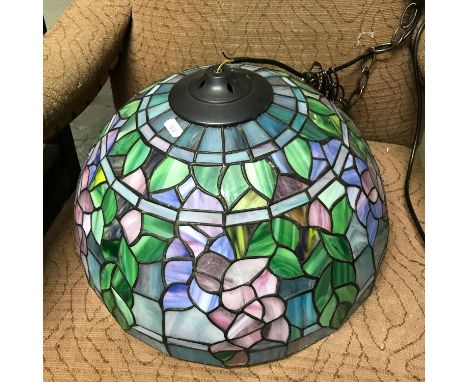 A Tiffany style ceiling light shade. 