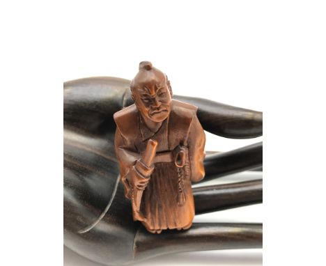 Sold at Auction: A Japanese Meiji era carving of a sumo wrestler (H:16cm)