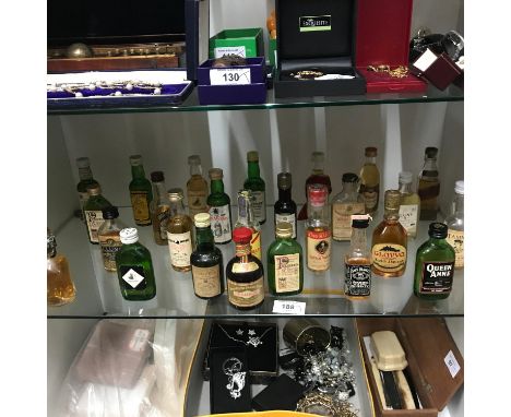 A Shelf of collectable whisky miniatures [all sealed] to include Drambuie, Chivas Regal, Dimple, Pinwinnie, Cluny,Cutty Sark,