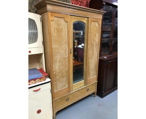 Antique light wood wardrobe with single mirror door and under drawer. Measures 96x128x43.5cm 