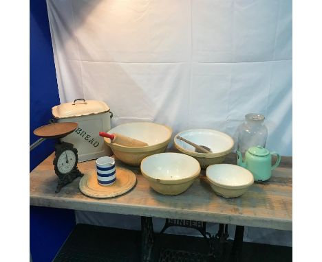 A Collection of vintage kitchen utensils to include Baking bowls, Enamel bread bin, Household weighing scales, Old hand carve