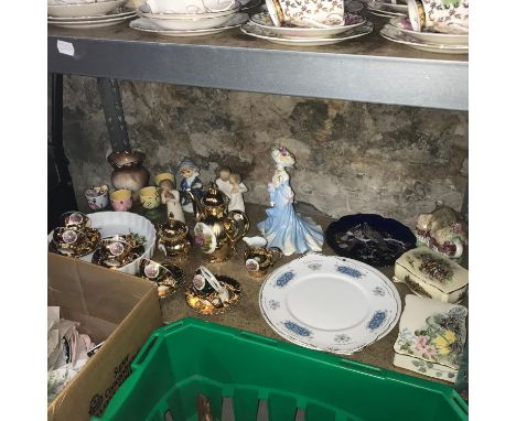 A Shelf of collectable porcelain and a box containing a Crown Ming China tea/ Dinner service. The shelf includes Coalport lad