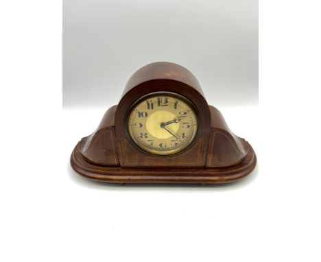 Edwardian French mantel clock, encased in a mahogany and single line inlaid case, Supported on four metal bun feet. In a work